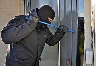 burglar opening a door